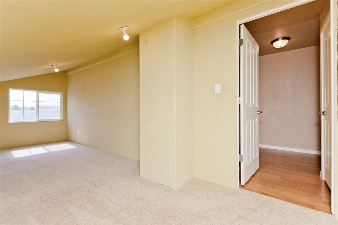 3138 Dublin Way Grand Junction, CO 81504 - Photo 24 of 42 an empty room with windows and entrance