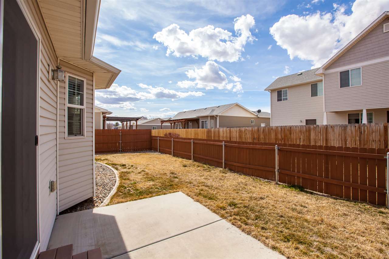 3138 Dublin Way Grand Junction, CO 81504 - Photo 31 of 42 a view of a backyard of the house