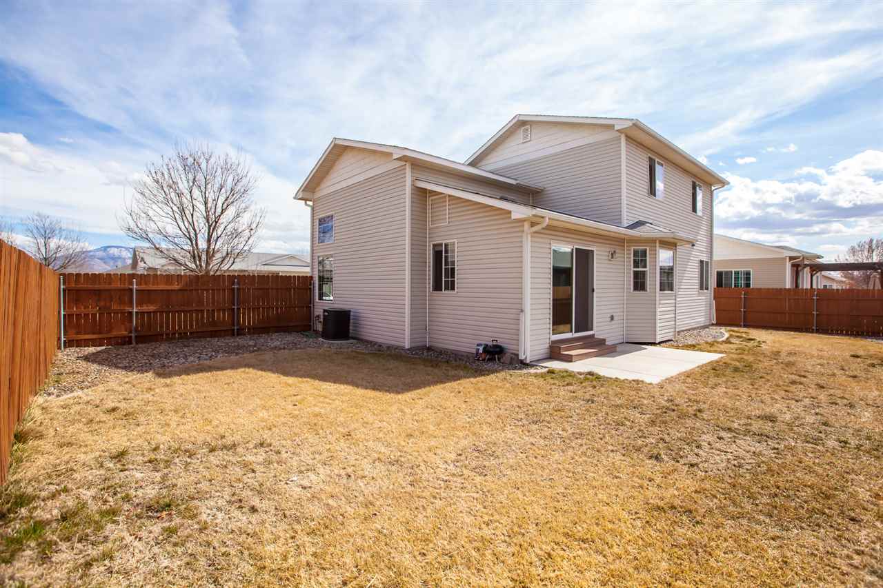 3138 Dublin Way Grand Junction, CO 81504 - Photo 36 of 42 a backyard of a house