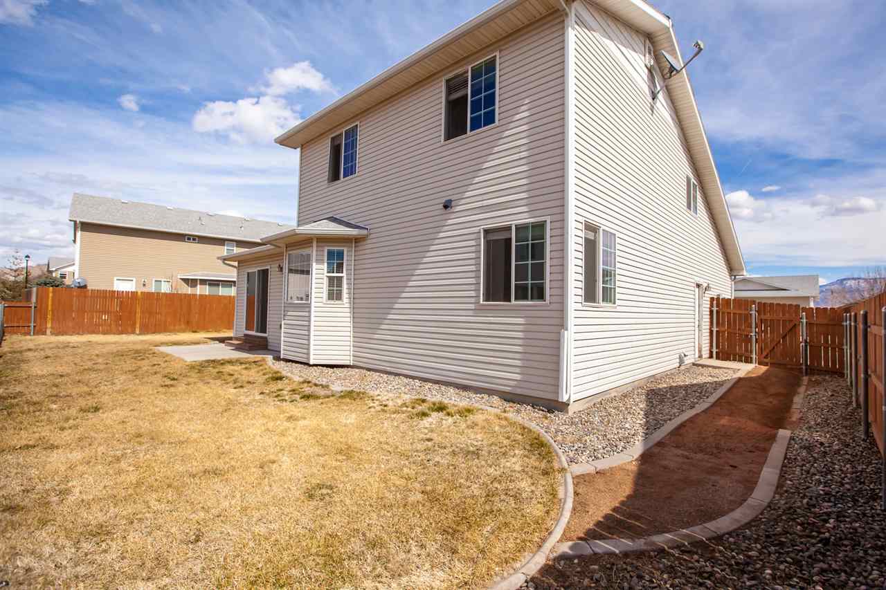 3138 Dublin Way Grand Junction, CO 81504 - Photo 39 of 42 a view of a house with a backyard