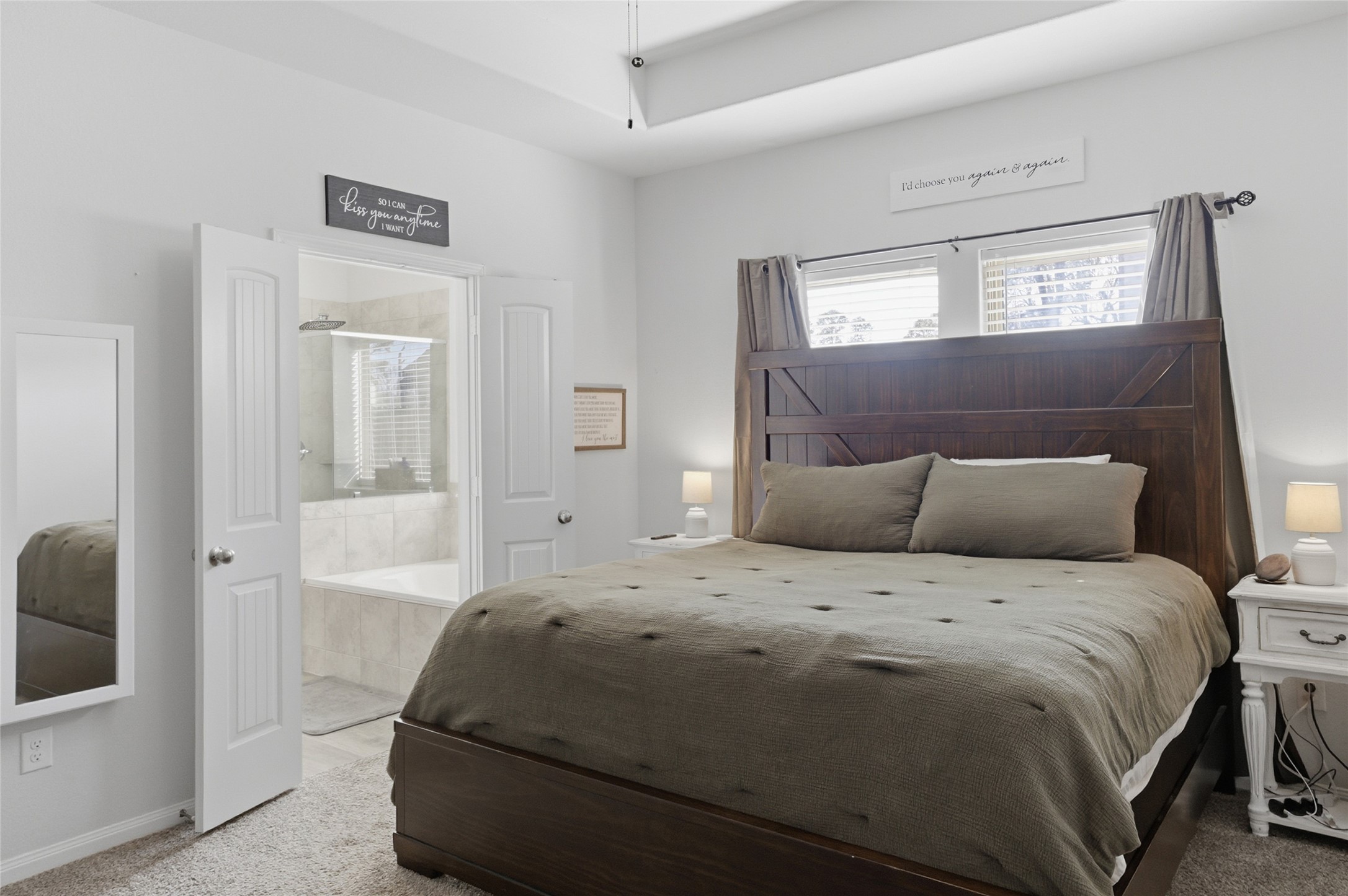 1495 Alice Drive Beaumont, TX 77705 - Photo 8 of 8 a bedroom with a bed and a mirror