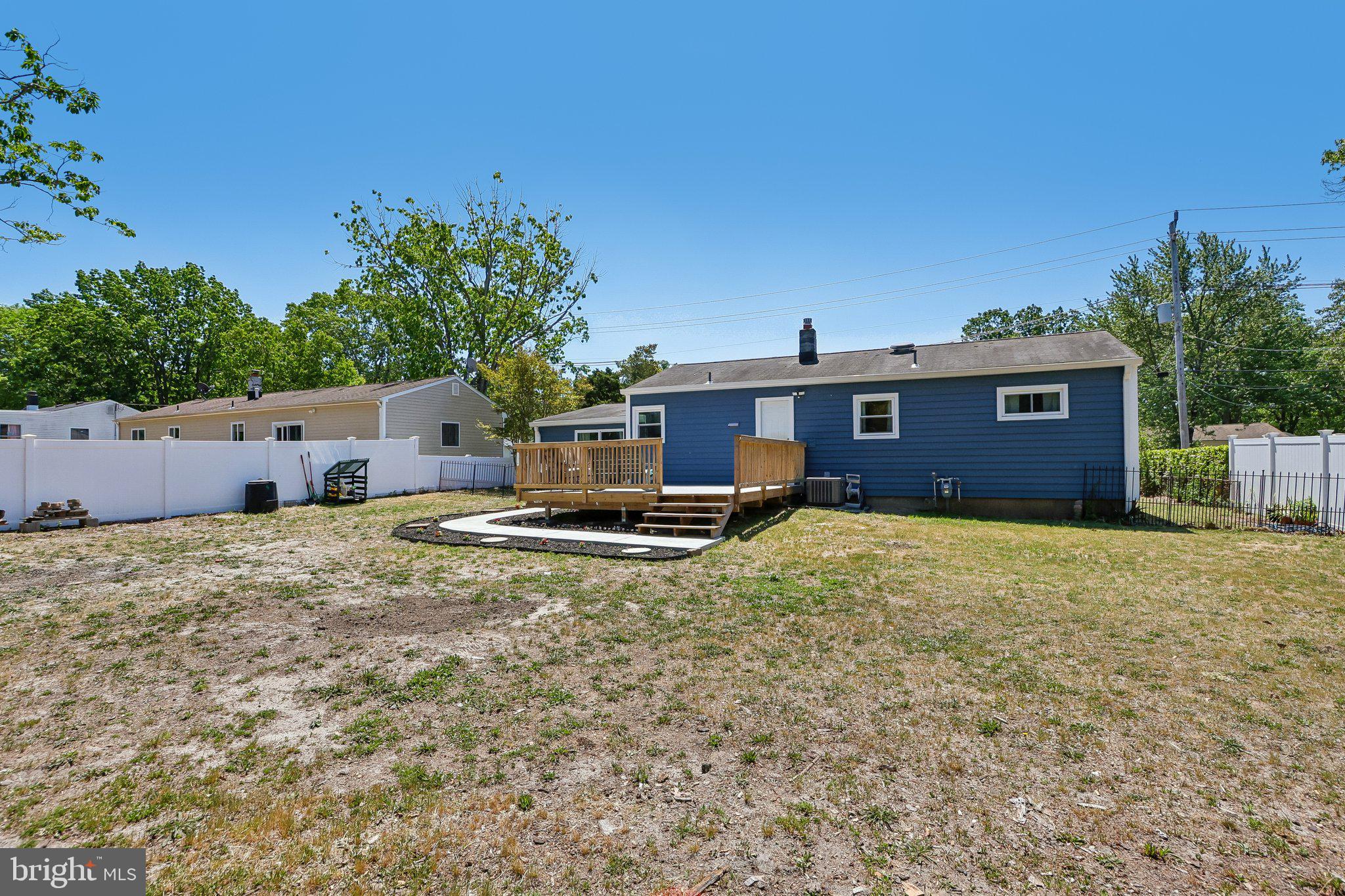 73 Burnt Tavern Road Brick, NJ 08724 - Photo 29 of 31 a view of a house with backyard space and a tree