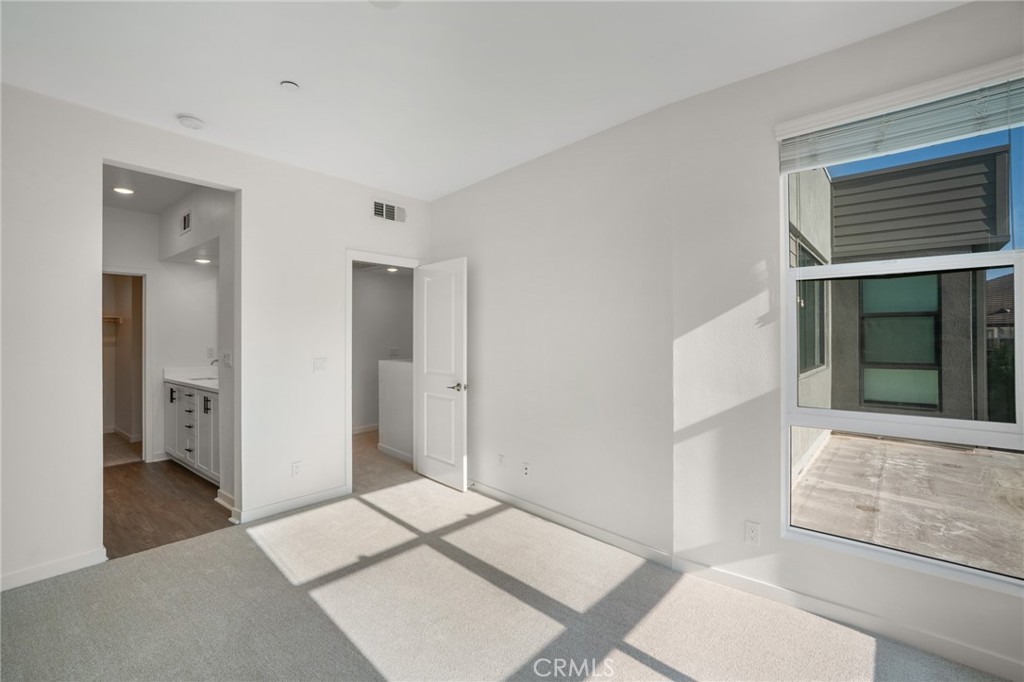 11055 Wander Drive Rancho Cucamonga, CA 91730 - Photo 11 of 28 a bathroom with a sink and a mirror
