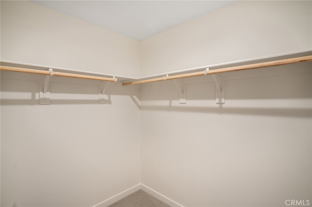 11055 Wander Drive Rancho Cucamonga, CA 91730 - Photo 15 of 28 a view of a room with racks on the wall