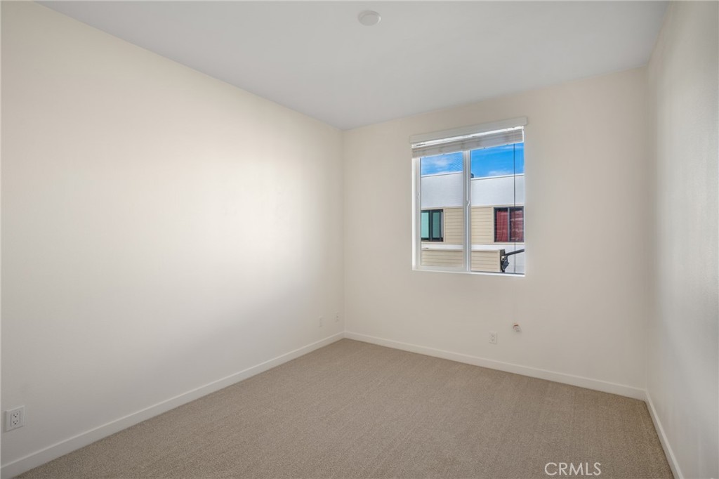 11055 Wander Drive Rancho Cucamonga, CA 91730 - Photo 17 of 28 a view of an empty room with a window