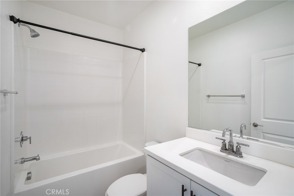 11055 Wander Drive Rancho Cucamonga, CA 91730 - Photo 18 of 28 a bathroom with a sink toilet and shower