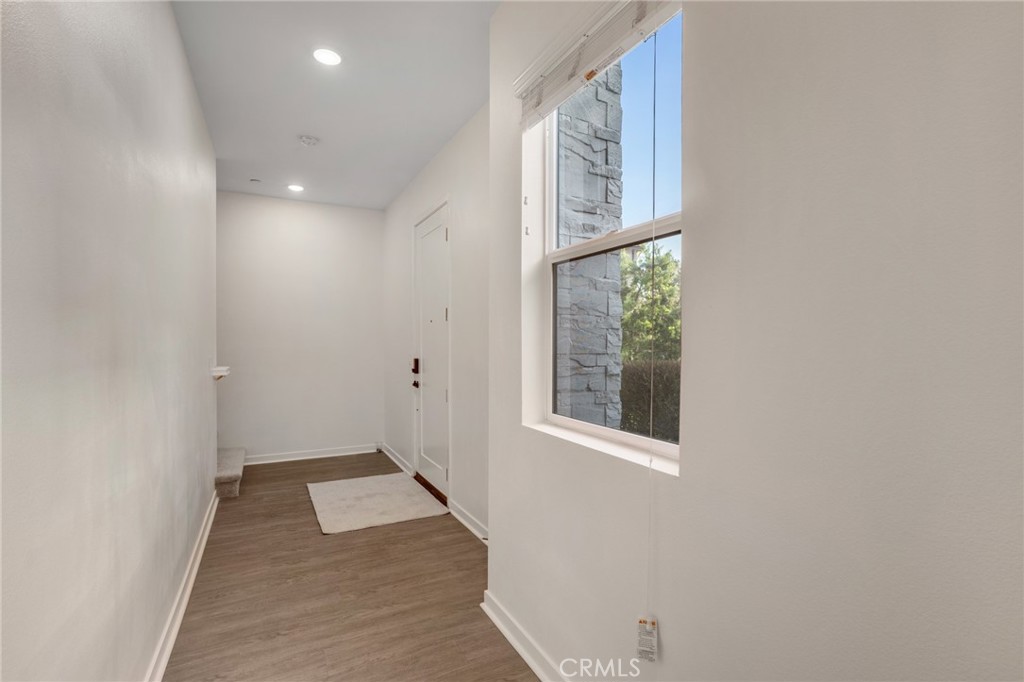 11055 Wander Drive Rancho Cucamonga, CA 91730 - Photo 19 of 28 an empty room with windows