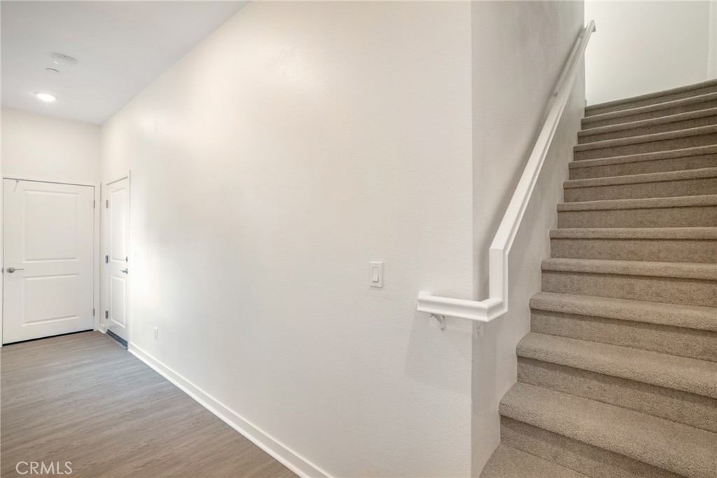 11055 Wander Drive Rancho Cucamonga, CA 91730 - Photo 20 of 28 a view of entryway with wooden floor
