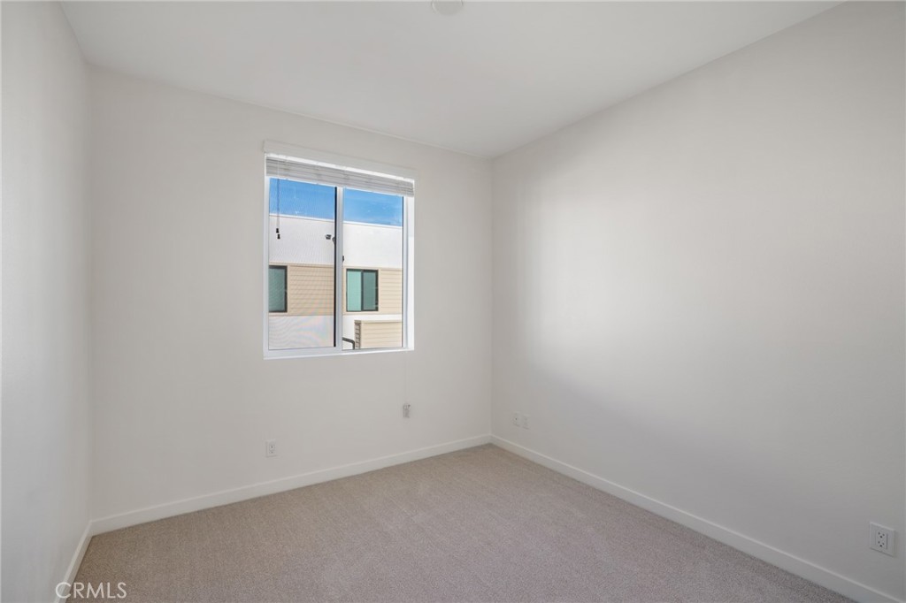 11055 Wander Drive Rancho Cucamonga, CA 91730 - Photo 21 of 28 an empty room with a window