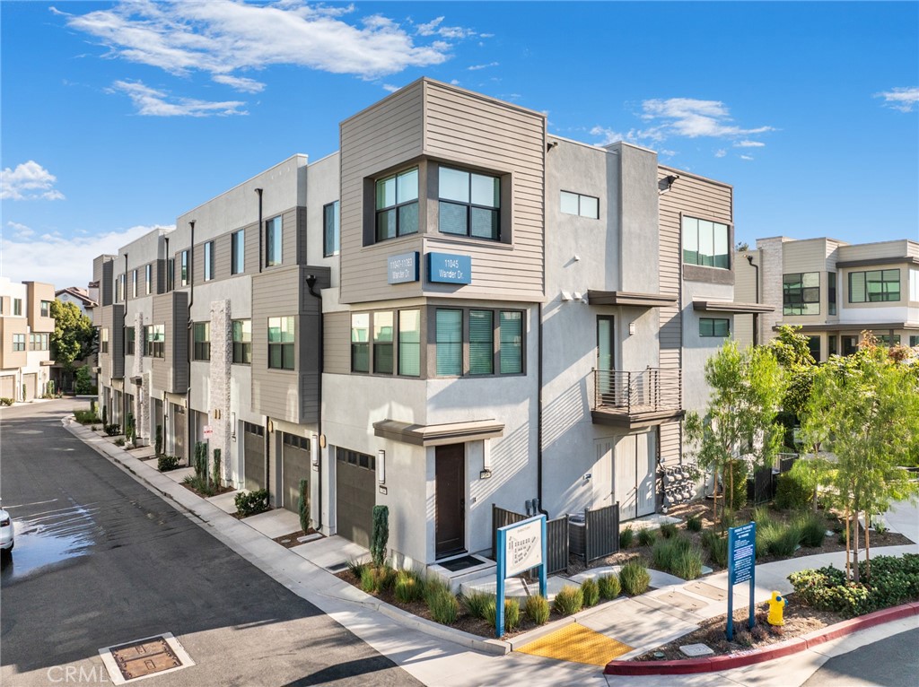 11055 Wander Drive Rancho Cucamonga, CA 91730 - Photo 3 of 28 a front view of a building with street view
