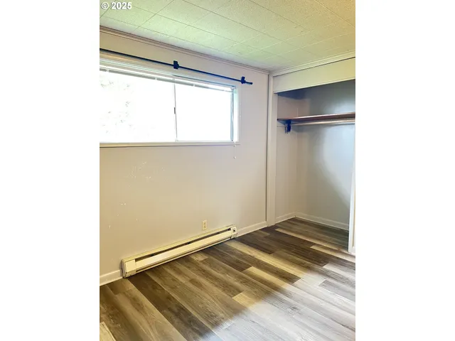 a view of a room with a bench