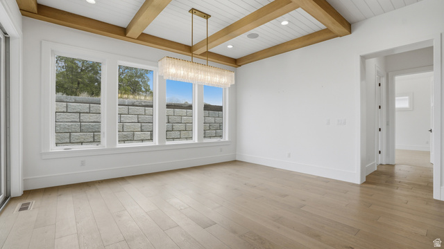 1682 North 1950 W Street, Unit 9 Provo, UT 84604 - Photo 21 of 84 Spacious interior featuring wide plank wood-finish flooring, a beamed and shiplap ceiling, recessed lighting, and a linear chandelier