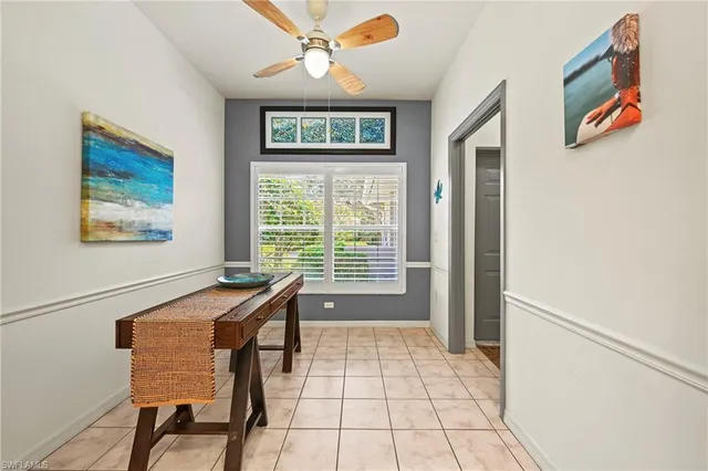 a view of a livingroom with furniture and windows