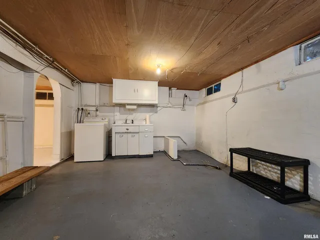 a view of a room with wooden walls