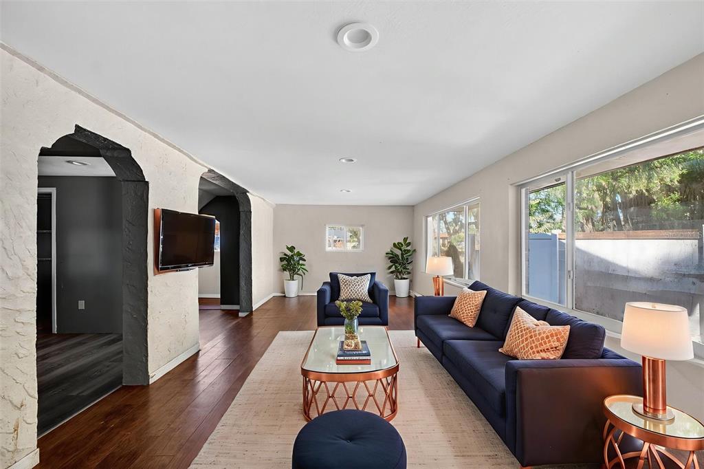 842 Channing Road Lakeland, FL 33805 - Photo 4 of 27 a living room with furniture and a flat screen tv