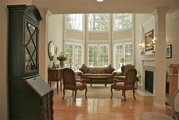 11 Amanda Road Sudbury, MA 01776 - Photo 3 of 30 a living room with furniture and a floor to ceiling window