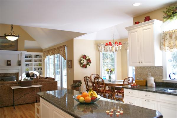 11 Amanda Road Sudbury, MA 01776 - Photo 10 of 30 a kitchen with stainless steel appliances a sink a stove a refrigerator and cabinets
