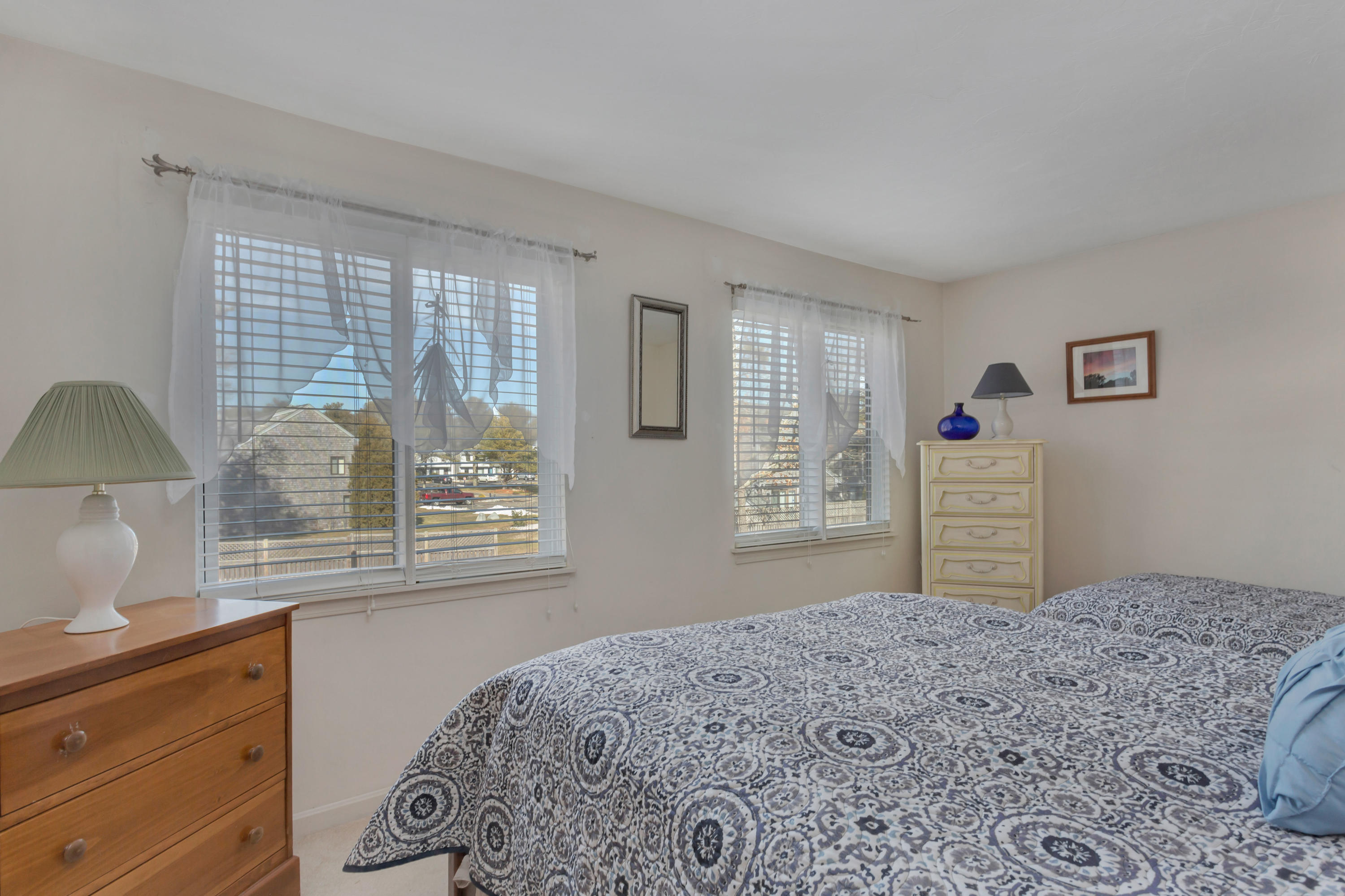 22 Crescent Lane Brewster, MA 02631 - Photo 21 of 43 a bedroom with a bed and a window