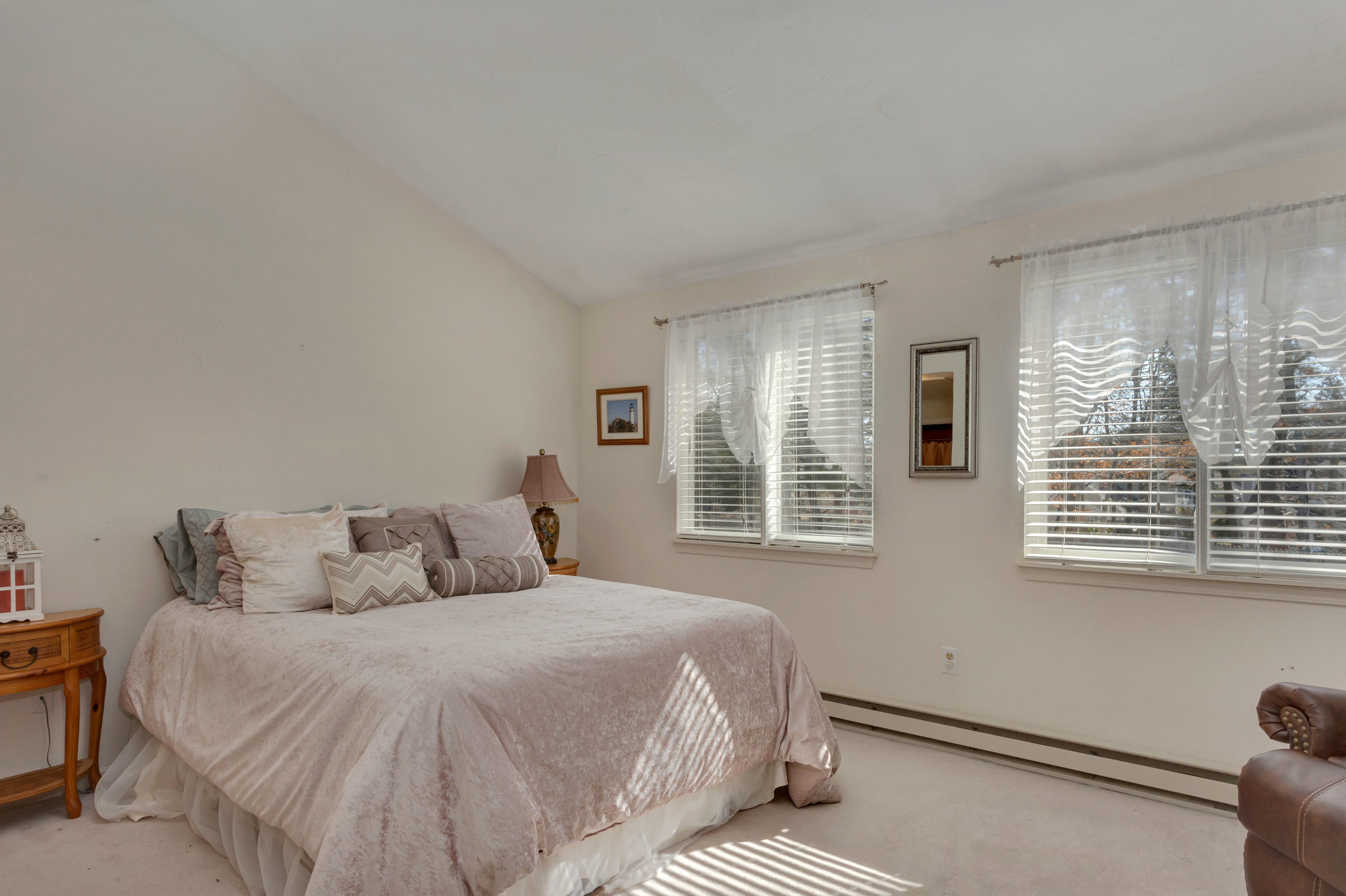 22 Crescent Lane Brewster, MA 02631 - Photo 24 of 43 a bedroom with a bed and a window