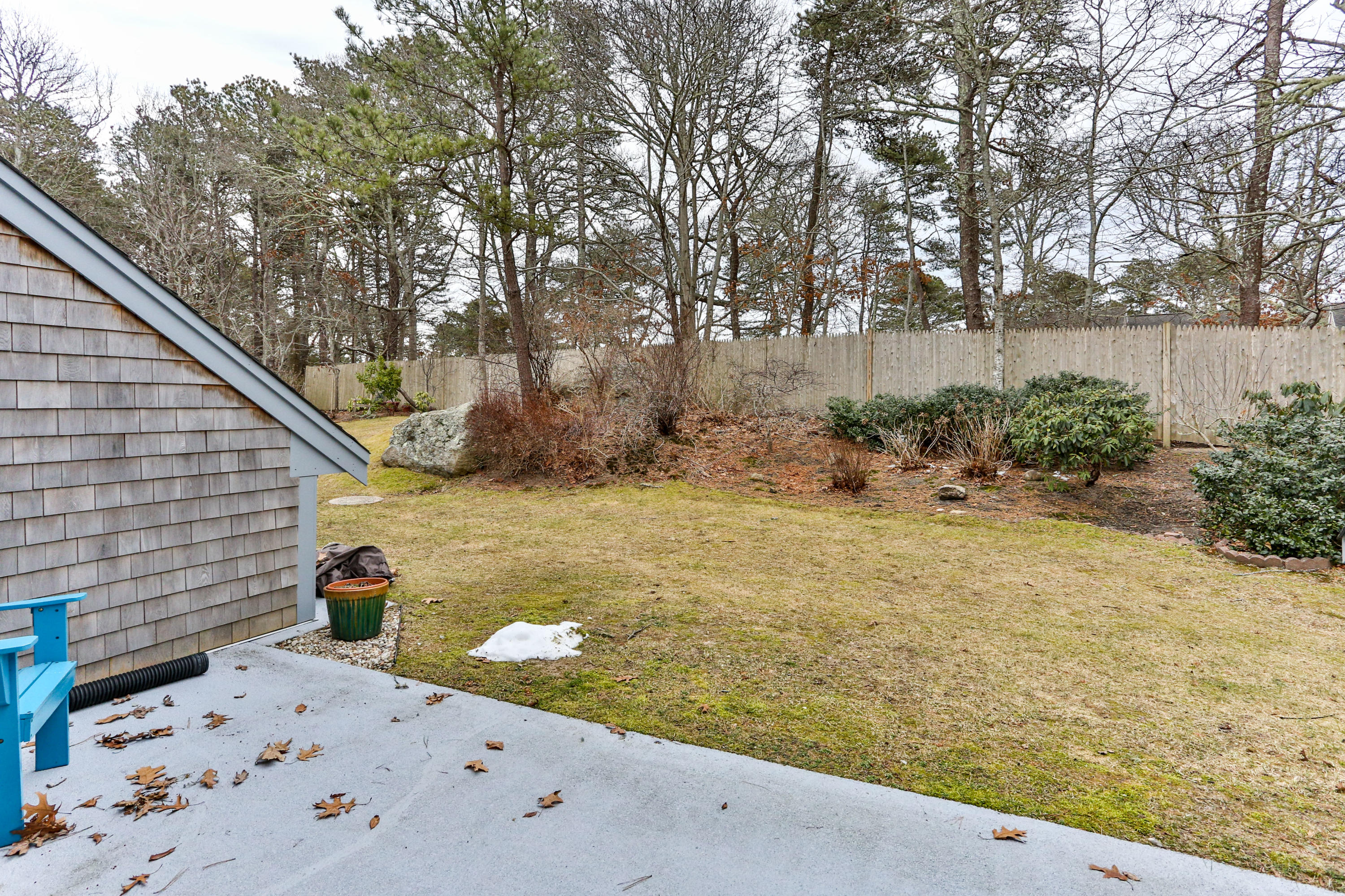 22 Crescent Lane Brewster, MA 02631 - Photo 29 of 43 a view of a backyard of the house