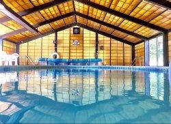 22 Crescent Lane Brewster, MA 02631 - Photo 34 of 43 a view of empty room with wooden floor and floor to ceiling window