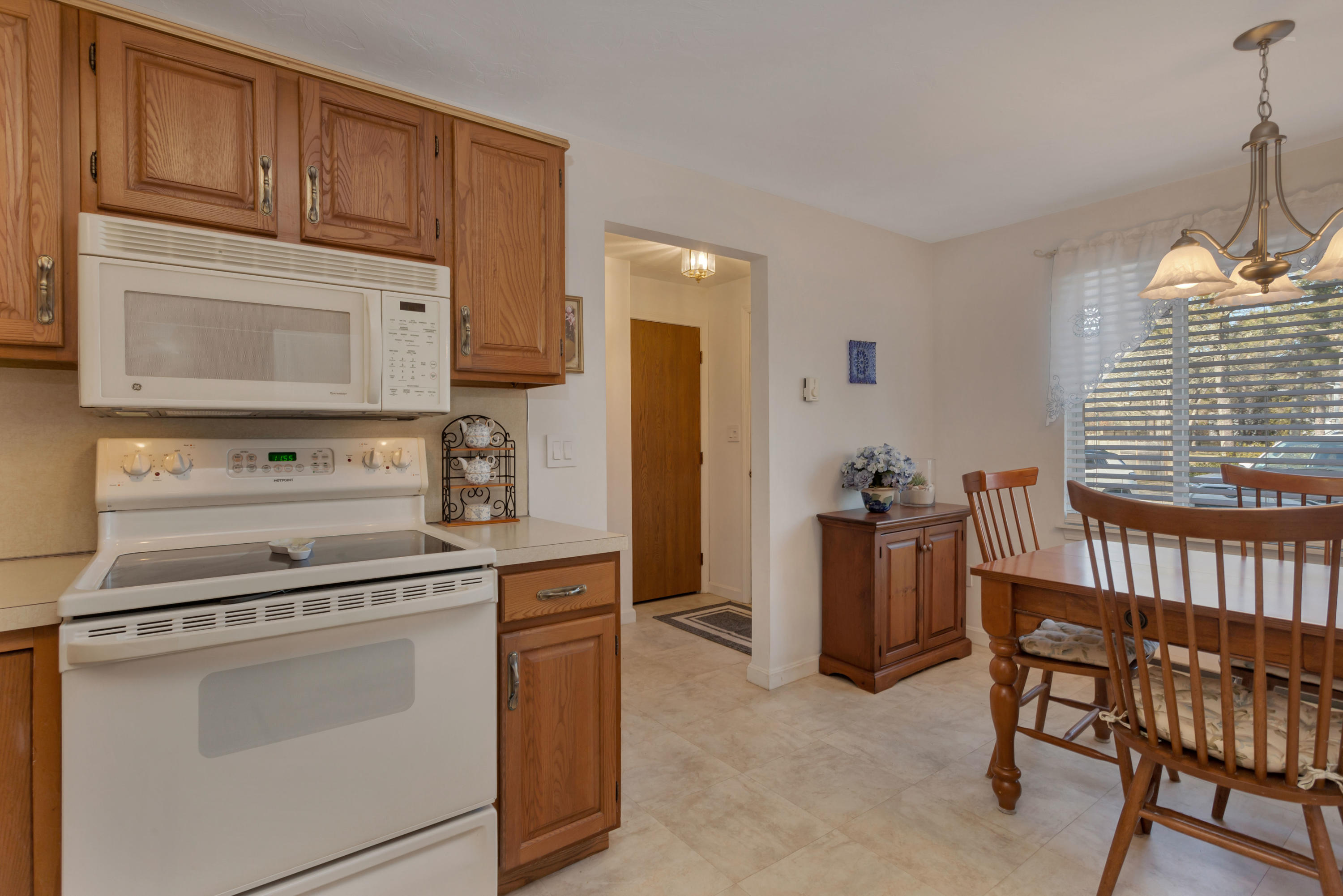 22 Crescent Lane Brewster, MA 02631 - Photo 10 of 43 a kitchen with a stove microwave and cabinets