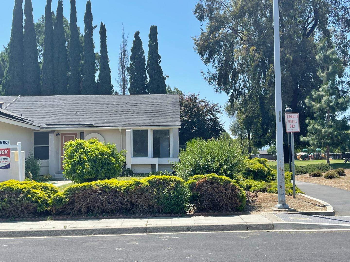 1363 Moonlight Circle Milpitas, CA 95035 - Photo 18 of 20 a view of a house with a garden and plants