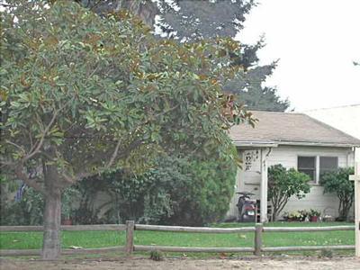 140 East Not Slo Road Santa Maria, CA 93455 - Photo 1 of 1 a view of a house with a yard and plants