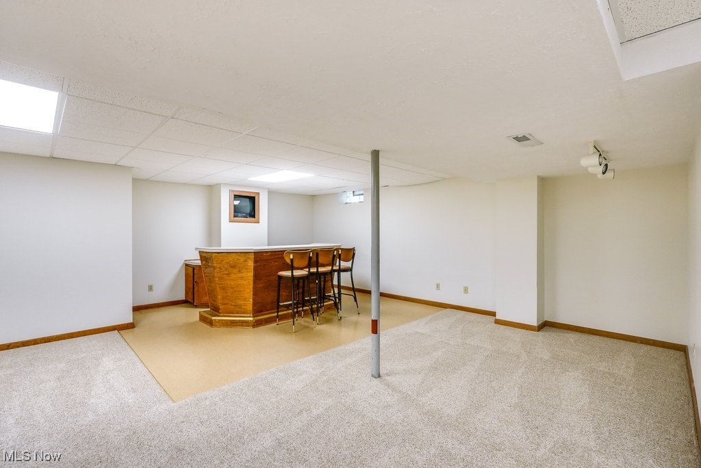 11662 Dunham Road Northfield, OH 44067 - Photo 37 of 50 Wetbar area for those entertaining times open to large gaming area
