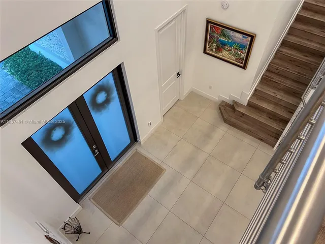 a lobby with furniture and a livingroom