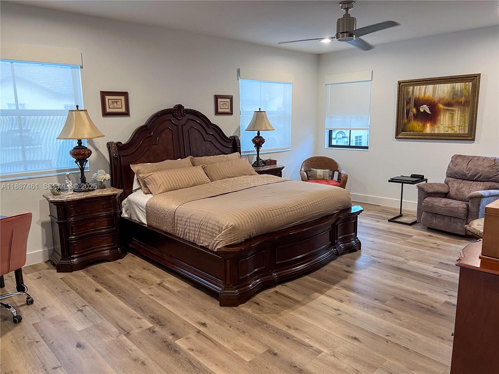 8904 Southwest 69th Trail Miami, FL 33173 - Photo 27 of 42 a bedroom with a bed and a couch