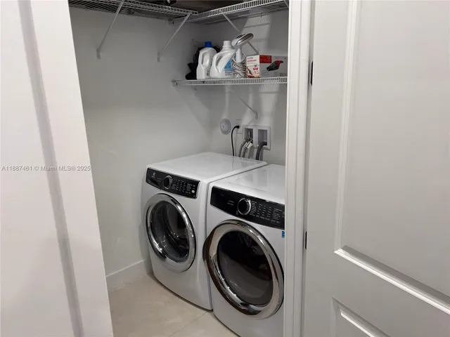 a view of an outside dining space with furniture