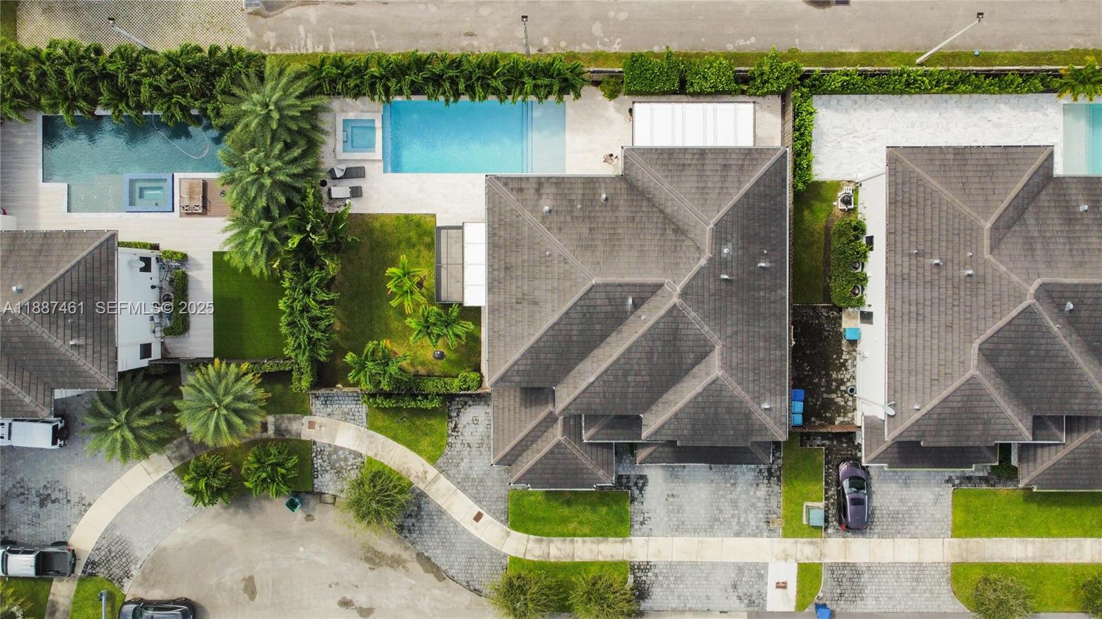 8904 Southwest 69th Trail Miami, FL 33173 - Photo 7 of 42 an aerial view of residential houses with outdoor space and trees