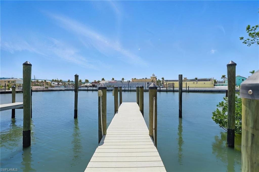 855 Lagoon Street, Unit 4 Fort Myers Beach, FL 33931 - Photo 11 of 40 a wooden bridge near lake