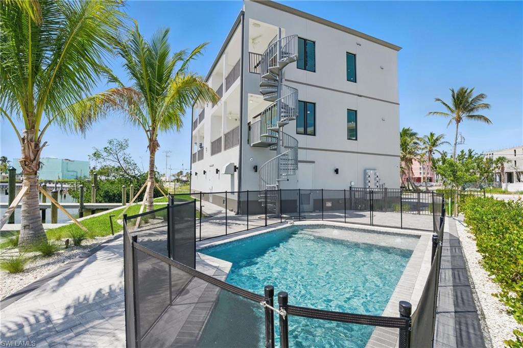 855 Lagoon Street, Unit 4 Fort Myers Beach, FL 33931 - Photo 15 of 40 a house view with a sitting space