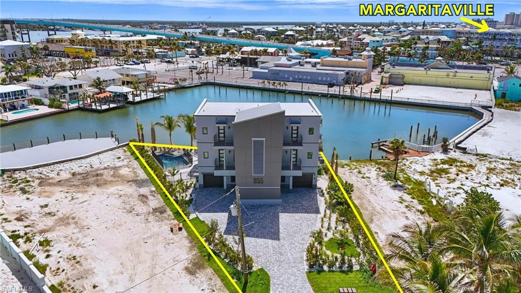 855 Lagoon Street, Unit 4 Fort Myers Beach, FL 33931 - Photo 7 of 40 an aerial view of a house with outdoor space