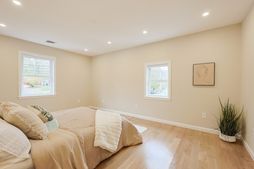 81 Elliott Street Danvers, MA 01923 - Photo 13 of 31 a living room with furniture and a window