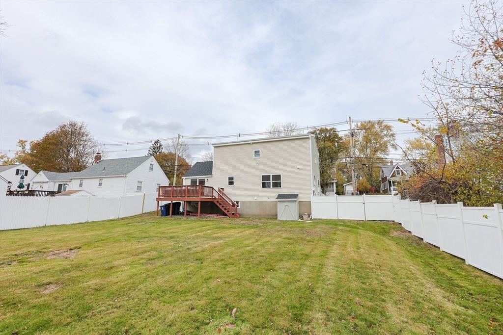 81 Elliott Street Danvers, MA 01923 - Photo 24 of 31 a house view with a garden space