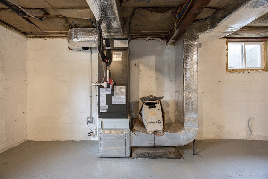 81 Elliott Street Danvers, MA 01923 - Photo 30 of 31 a view of water heater room