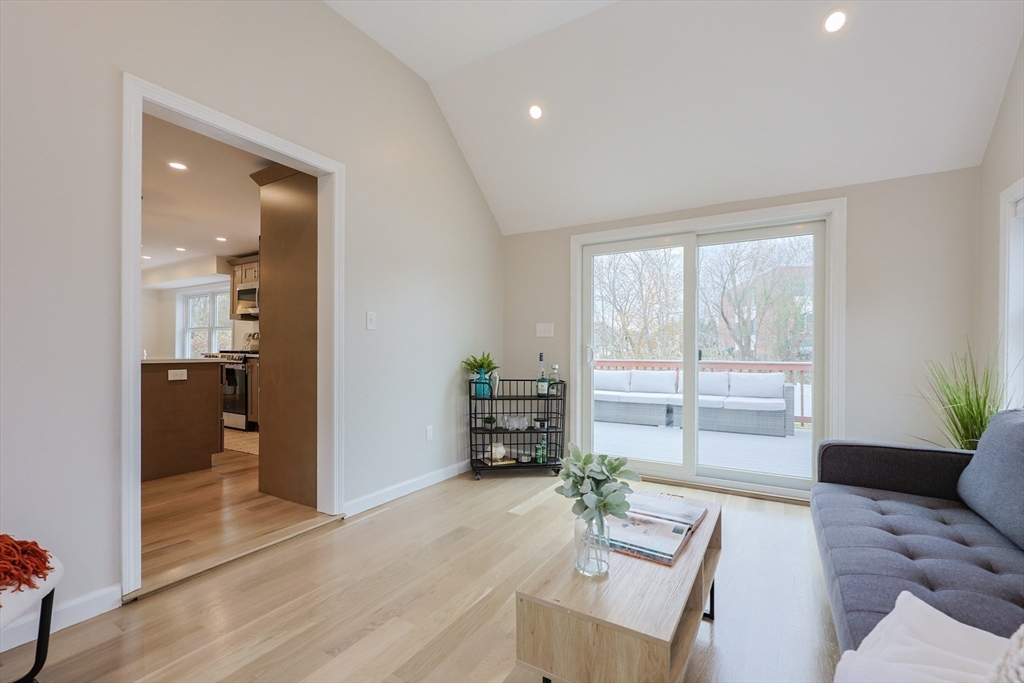 81 Elliott Street Danvers, MA 01923 - Photo 9 of 31 a living room with furniture and wooden floor