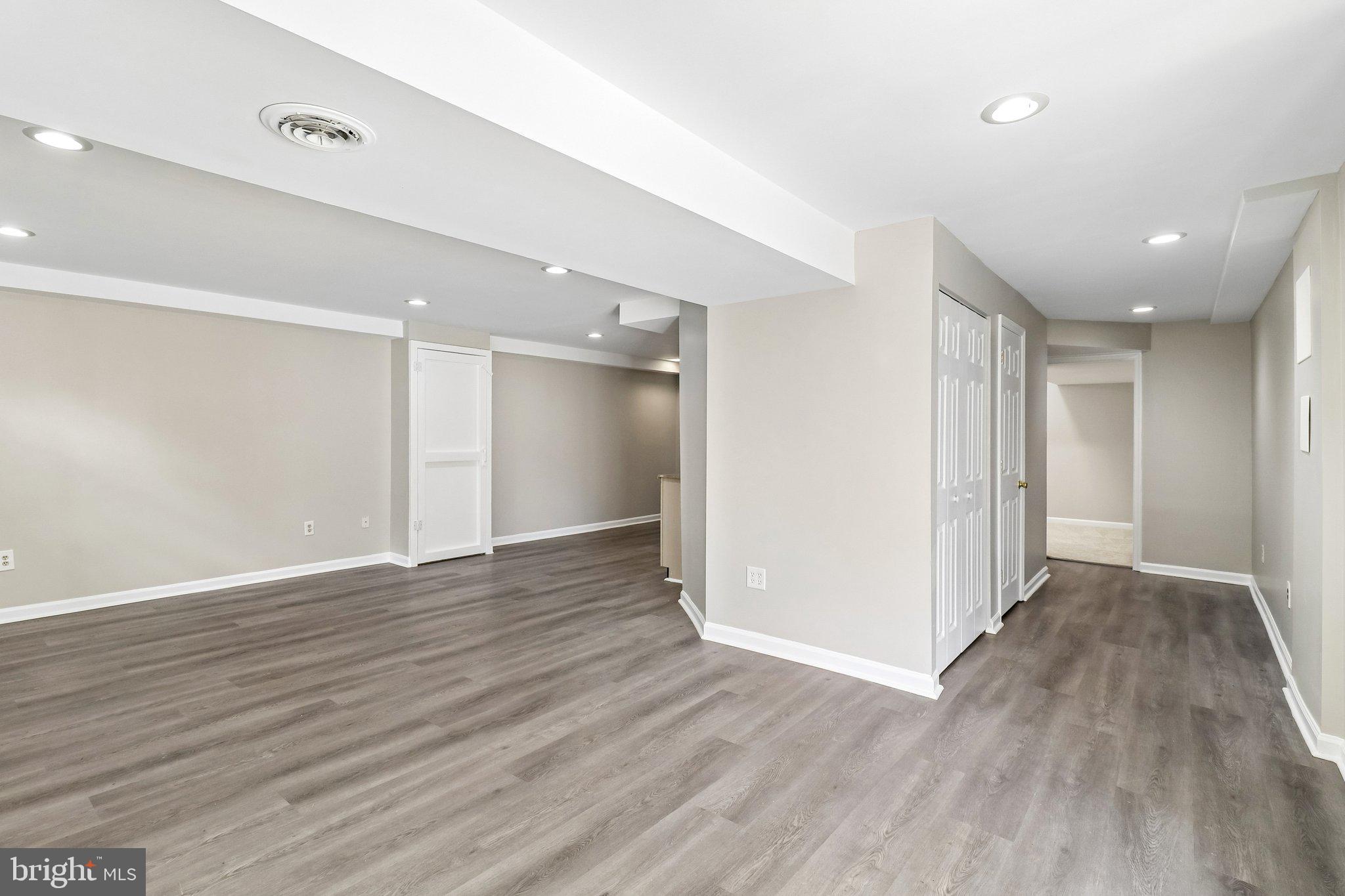 12408 Triple Crown Road Gaithersburg, MD 20878 - Photo 56 of 87 Huge rec room that leads to lower level den..