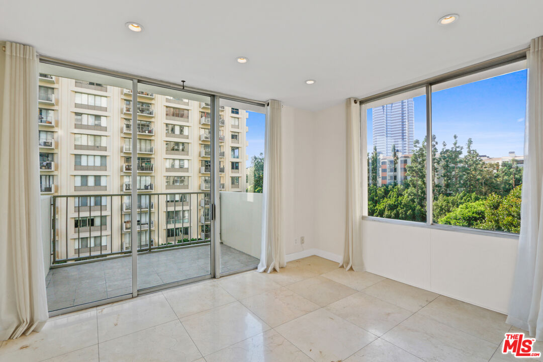 2160 Century Park, Unit 605 Los Angeles, CA 90067 - Photo 5 of 18 a view of an empty room with a window
