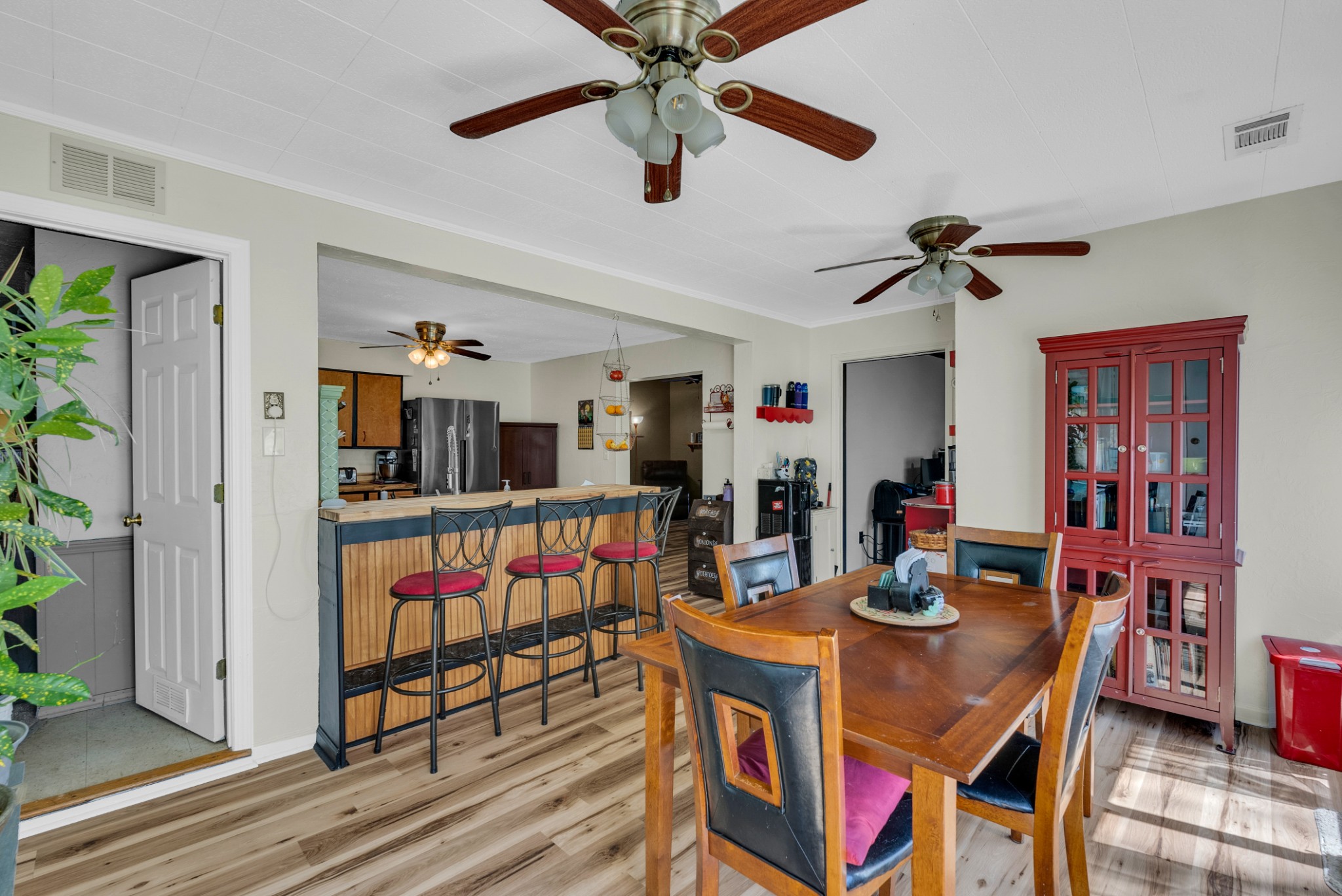 105 Dripping Springs Road Monterey, TN 38574 - Photo 14 of 49 a view of a dining room with furniture a rug and wooden floor