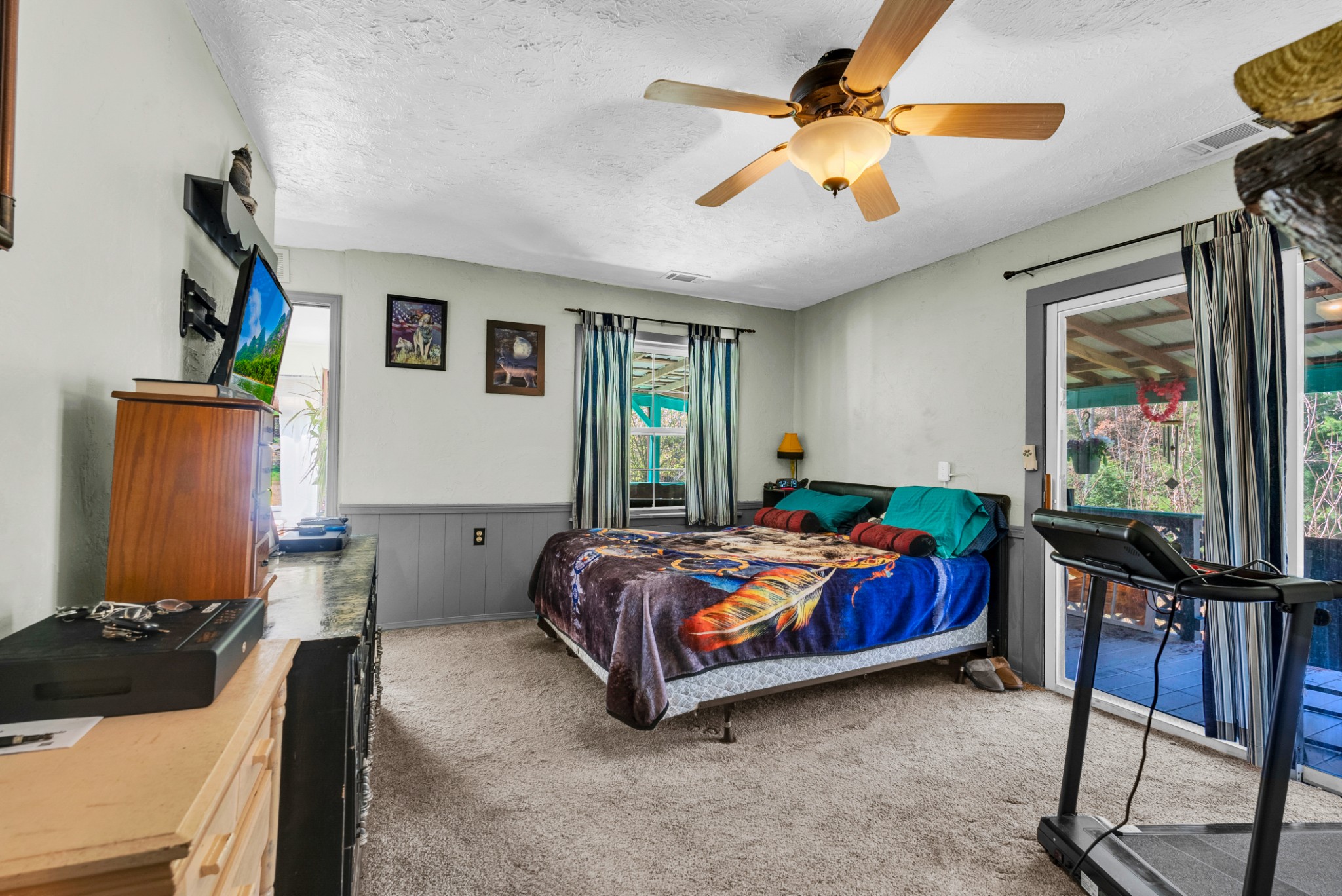 105 Dripping Springs Road Monterey, TN 38574 - Photo 16 of 49 a bed room with a bed and a chair