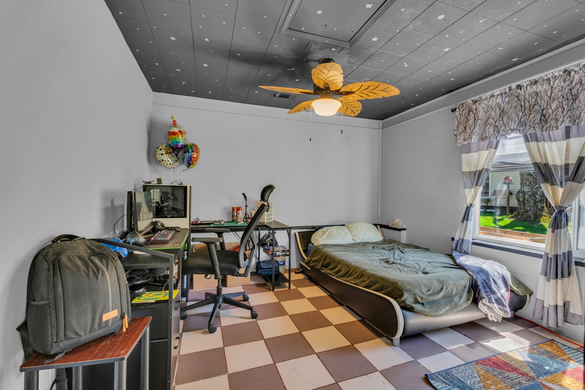 105 Dripping Springs Road Monterey, TN 38574 - Photo 20 of 49 a bedroom with a bed and a chandelier