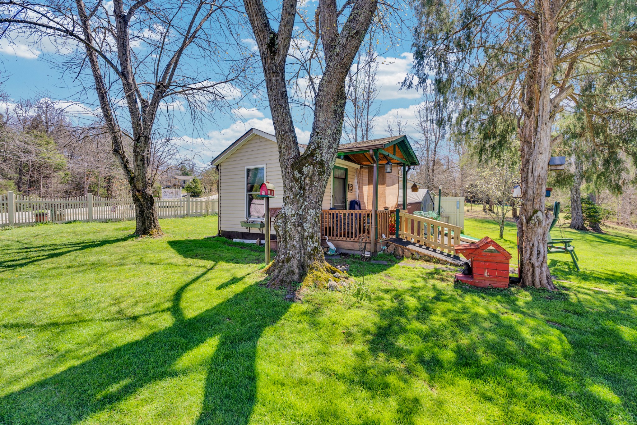 105 Dripping Springs Road Monterey, TN 38574 - Photo 34 of 49 a view of a house with backyard and a tree