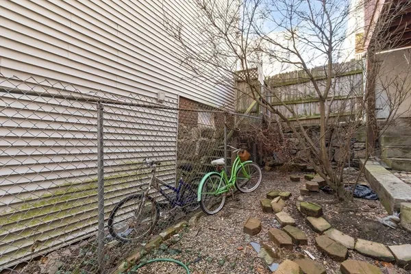 a view of a back yard of the house