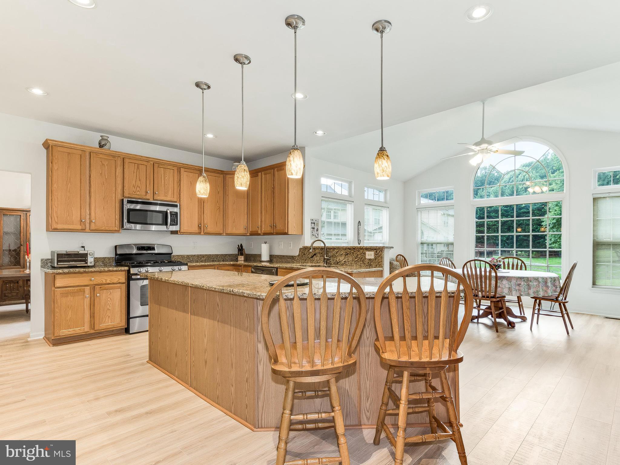 18732 Olney Mill Road Olney, MD 20832 - Photo 7 of 20 Kitchen and sunroom