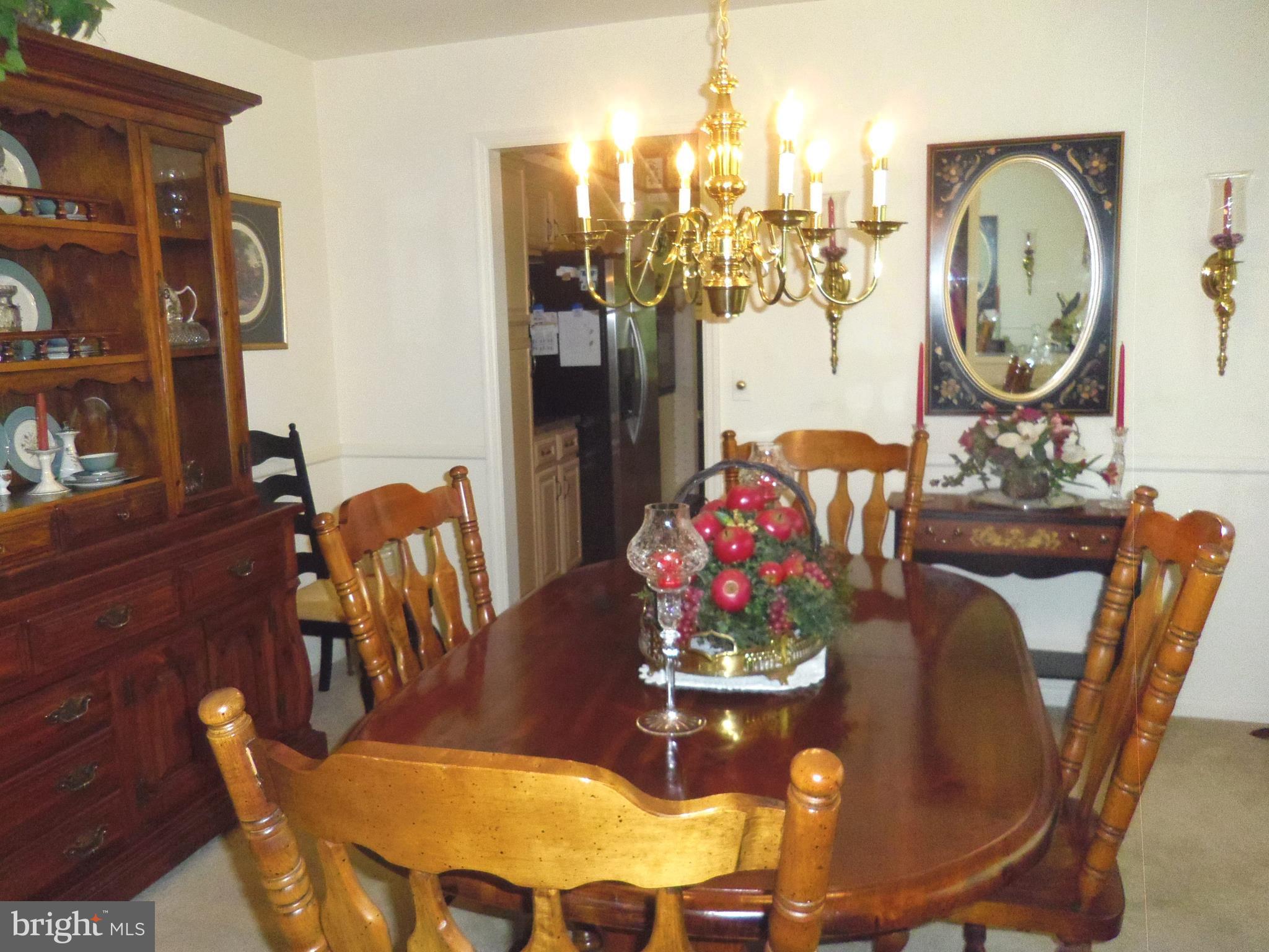 2 Manor Brook Road Monkton, MD 21111 - Photo 8 of 22 a view of a dining room with furniture