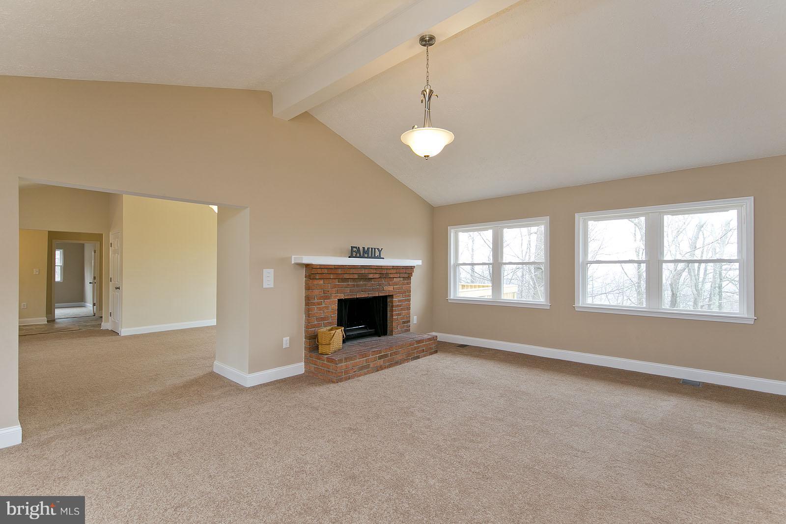 252 Trillium Trail Road Linden, VA 22642 - Photo 8 of 30 Family Room opens to dining room